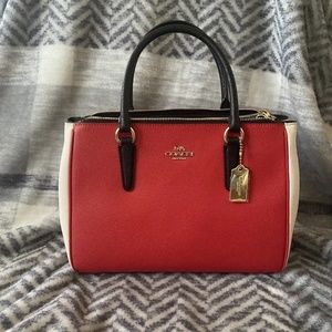 Beautiful Medium Coach Handbag. New with tags.  Excellent Condition.